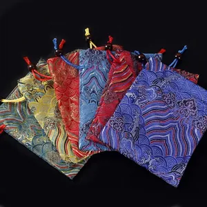 Pochettes à bijoux traditionnelles chinoises en brocart avec cordon et motifs de vagues
