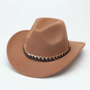 Detail view of a classic camel brown suede fedora hat with elegant gold chain accessory