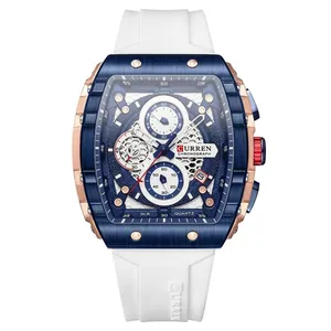 Detailed view of CURREN sport watch with blue octagonal bezel and white silicone strap.