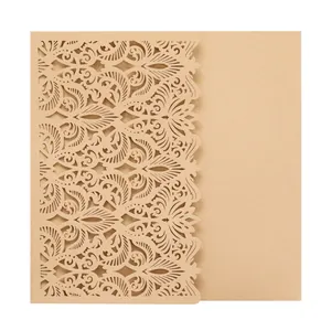 Intricate detailed view of laser-cut European style wedding invitation card in kraft paper