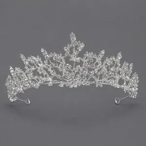 Elegant bridal tiara featuring silver vine patterns and sparkling rhinestone crystals.