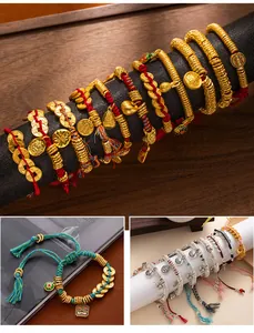 Detailed view of New Chinese style braided bracelets with golden ancient coin charms