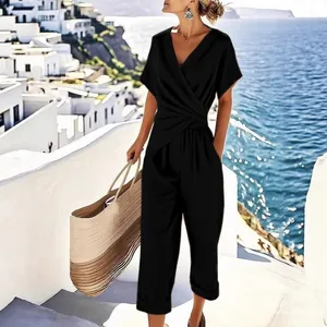 Elegant black V-neck short sleeve loose jumpsuit for summer vacation and commute