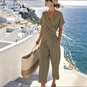 Elegant khaki V-neck jumpsuit with short sleeves and wide-leg trousers for summer