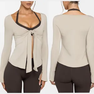 Vue détaillée avant et arrière d'un cardigan de yoga beige à nouer pour le fitness femme.