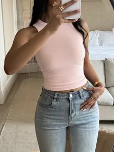 Close-up detail of a light pink ribbed tank top for women in trendy Y2K fitness style
