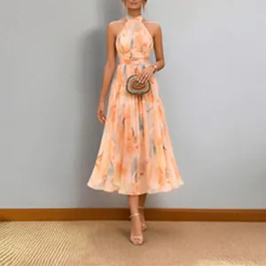 Robe d'été mi-longue vintage française à licou avec imprimé floral et taille ajustée élégante