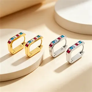 Detail view of U-shaped stainless steel earrings with colorful rectangular cubic zirconia