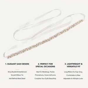 Detailed view of handmade bridal sash with pearl and rhinestone embellishments