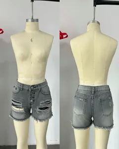 Detailed front and back comparison of grey high-waisted ripped denim shorts for women