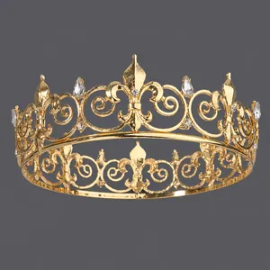 Exquisite vintage golden king crown featuring sparkling teardrop crystals and intricate filigree