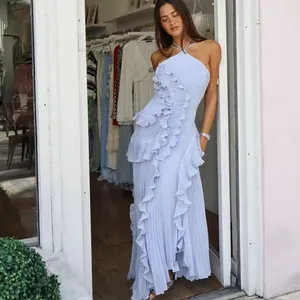 Detail view of light blue ruffle pleated halter maxi dress with cascading tiers