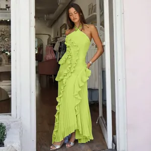 Elegant lime green pleated maxi dress with asymmetrical ruffles and halter neck.