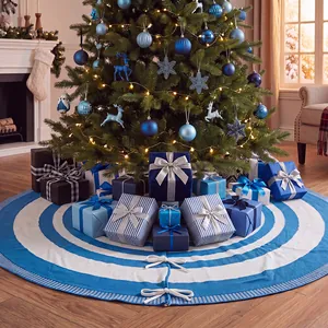 Blue and white striped knitted Christmas tree skirt decorating the base of a festive tree.
