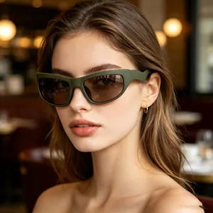 Model wearing Y2K olive green wrap-around sporty sunglasses for outdoor fashion
