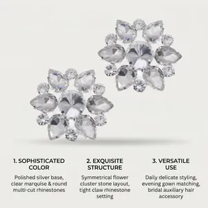 Detail of flower-shaped clear rhinestone shoe clips with polished silver base and claw setting
