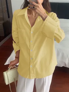 Stylish yellow long-sleeve casual button-up shirt for women perfect for autumn holidays