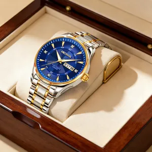 Luxury blue dial men's watch with gold-tone accents displayed in premium wooden box