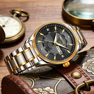 Close-up detail of a luxury men's watch featuring a black dial and diamond markers