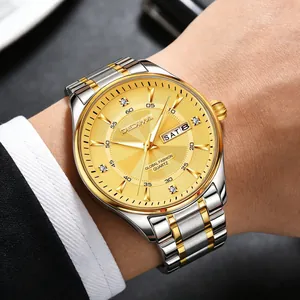 Luxury men's two-tone stainless steel watch with a gold dial and diamond markers