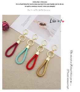 Four colorful handmade braided leather rope keychains with elegant gold-tone metal clasps