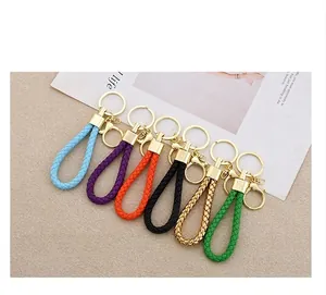 Handmade braided leather rope keychains in multiple vibrant colors for car keys and bags
