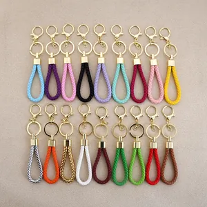 Colorful handmade braided leather keychains with gold metal rings for car keys