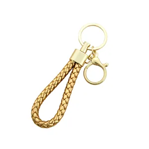 Elegant handmade gold braided leather rope car keychain with lobster clasp and ring