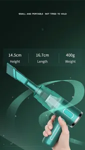 Close-up of portable wireless car vacuum cleaner showing compact dimensions and lightweight design