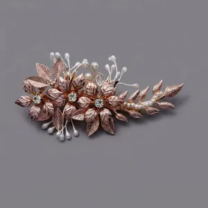 Handcrafted rose gold floral bridal hair clip with delicate alloy leaves and pearls