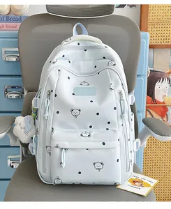 Sac à dos bleu clair à pois avec imprimés d'ours et porte-clés en peluche mignon