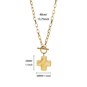 Detail of hammered cross pendant necklace with length and width dimensions