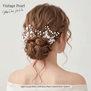 Close-up detail of two vintage pearl branch leaf hair pins styled on a model's hair bun