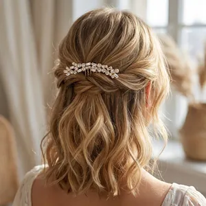 Elegant vintage bridal hair comb with sparkling zircons worn on wavy blonde hair