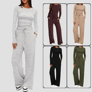 Women's two-piece lounge set with long sleeve top and wide leg pants in various color options.