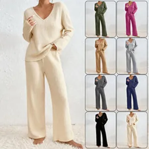 Multi-color two-piece ribbed knit lounge set featuring V-neck top and wide-leg pants.