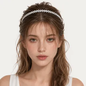Elegant silver-toned rhinestone headband for women in a minimalist luxury style