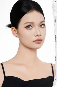 Detailed shot of cute S925 sterling silver black cat stud earrings on Asian model