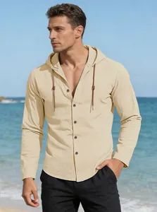 Detail of men's casual beige hooded long sleeve shirt with drawstring on a sunny beach