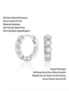 Close-up of S925 sterling silver hoop earrings set with shimmering cubic zirconia stones