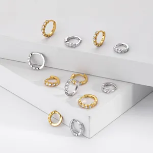 Close-up view of S925 sterling silver hoop earrings with full cubic zirconia stone setting