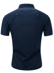 Back view of a navy blue short-sleeved men's cotton shirt in military workwear style