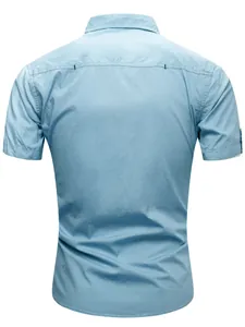 Detailed rear view of light blue men's short-sleeved cotton military work style shirt