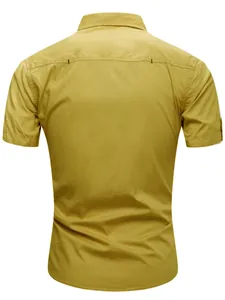Back view of men's mustard yellow short-sleeved cotton military workwear shirt