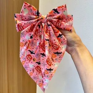 Nœud de cheveux d'Halloween rose avec motifs fantômes et citrouilles pour coiffure