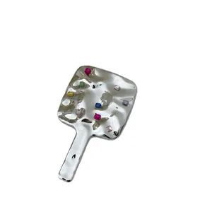 Retro silver handheld makeup mirror with colorful rhinestones and hammered texture