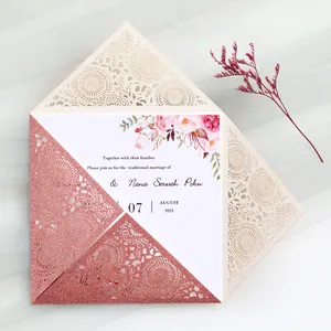 Elegant rose gold glitter laser cut wedding invitation card with intricate floral lace detail