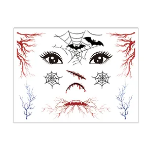 Detailed view of Halloween temporary face tattoo sheet with spider webs and scars.