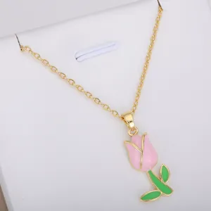 Elegant gold plated chain necklace with a delicate pink enamel tulip flower pendant