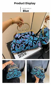 Close-up of blue sequin evening clutch bag with gold handle for wedding.